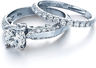 This image shows the setting with a 1.25ct round brilliant cut center diamond. The setting can be ordered to accommodate any shape/size diamond listed in the setting details section below. The matching wedding band is sold separately.