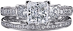 This image shows the setting with a 1.25ct princess cut center diamond. The setting can be ordered to accommodate any shape/size diamond listed in the setting details section below. The matching wedding band is sold separately.