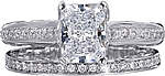 This image shows the setting with a 1.25ct radiant cut center diamond. The setting can be ordered to accommodate any shape/size diamond listed in the setting details section below. The matching wedding band is sold separately.
