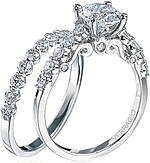 This image shows the setting with a 1.25ct round brilliant cut center diamond. The setting can be ordered to accommodate any shape/size diamond listed in the setting details section below. The matching wedding band is sold separately.