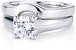 This image shows the setting with a 1.00ct round brilliant cut center diamond. The setting can be ordered to accommodate any shape/size diamond listed in the setting details section below.
